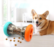 Interactive treat dispensing ball for dogs